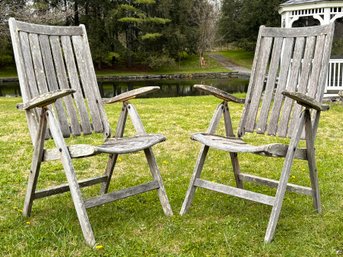 A Pair Of High Quality Weathered Teak Arm Chairs