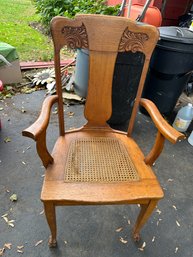 Oak Carved Caned Seat Arm Chair