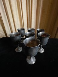 Set Of Stemmed Metal Cups