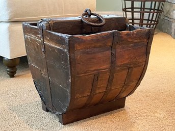 An Antique Well Bucket - Repurposed As Magazine Rack