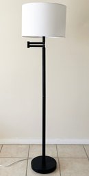 A Modern Articulating Arm Floor Lamp