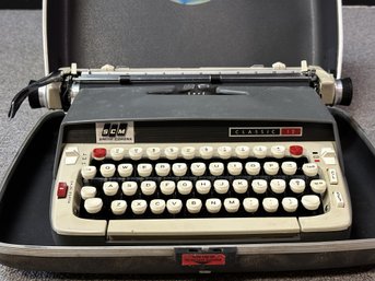 A Vintage Smith-Corona Classic 12 Typewriter With Carrying Case