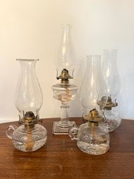 Four Fully Restored Glass Oil Lamps - Incl. Two Finger Lamps With A Queen Anne Burner