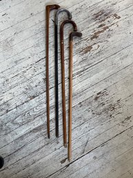 Four Vintage Walking Sticks