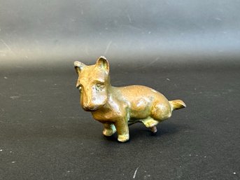 A Tiny Little Brass Dog