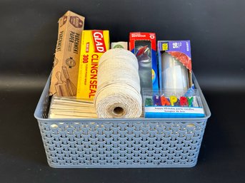 A Decorative Plastic Storage Bin Full Of Helpful Kitchen Items