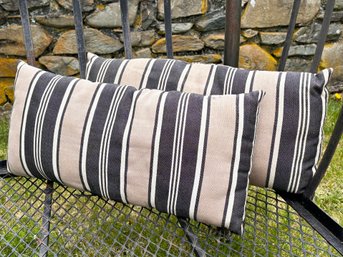 A Pair Of Striped Outdoor Pillows