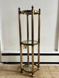 A Brass And Glass Plant Stand