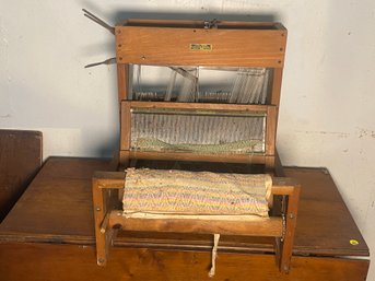 AN ANTIQUE TABLE TOP LOOM