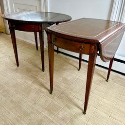 A Pair Of Drop Leaf Leather Topped End Tables