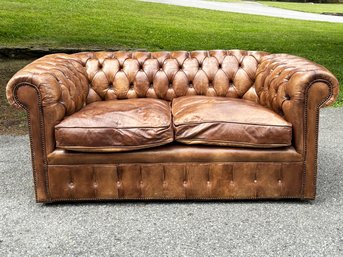 A Gorgeous Vintage Tufted Chestnut Leather Chesterfield Causeause
