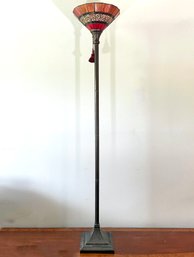 A Bronze And Stained Glass Standing Lamp