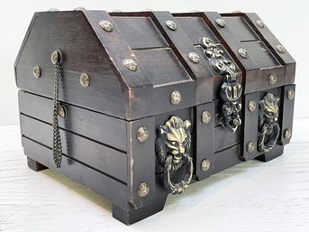 A Jewelry Box In Treasure Chest Form