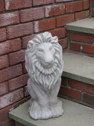 A Cast Concrete Lion Statue In Gray