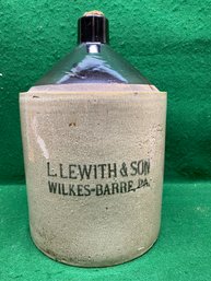 Antique Stoneware Jug. L. Lewith & Son Wilkes - Barre, PA. 13 1/4' Tall. 8 3/4' Base. No Shipping.