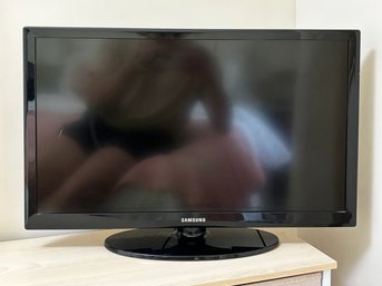 A 26' Samsung Flat Screen TV