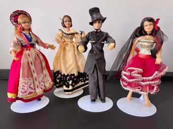 Grouping Of Four Souvenir Dolls In Period Costumes With Stands