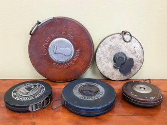 A Group Of Vintage And Antique Measuring Tapes