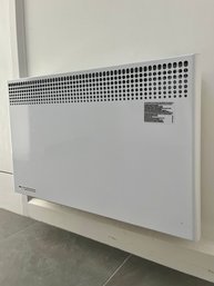 A Stelpro Wall Mount Radiator - Laundry Room