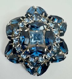 GORGEOUS SIGNED KRAMER BLUE RHINESTONE SILVER TONE FLOWER FORM BROOCH