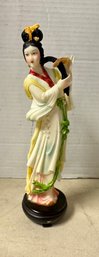 Adorable Chinese Girl With Long Hair Combing Figurine With A Wooden Stand Base. LH / C4