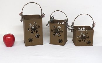 A Trio Of Metal Snowflake Tea Light Candle Bags For The Holidays