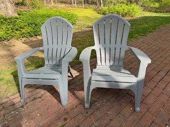 Pair Of Resin Adirondack Chairs