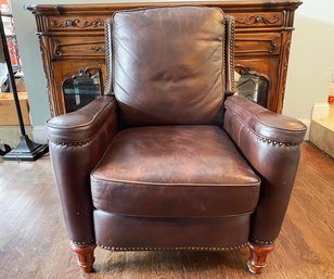 An Elegant Leather Reclining Arm Chair With Brass Nailhead Trim