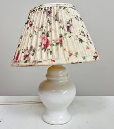 A Vintage Ceramic Lamp With Pleated Floral Shade By Laura Ashley