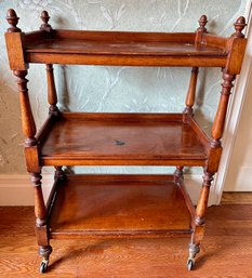 Vintage 3 Tier Etagere With Turned Spindles On Casters