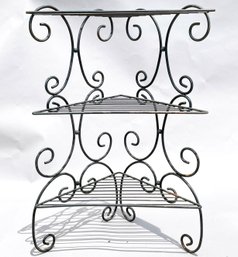 A Wrought Iron Corner Shelf