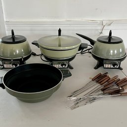 A Set Of Vintage Fondue Pots