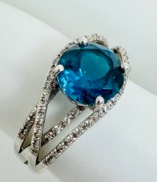 VINTAGE STERLING SILVER BLUE AND WHITE TOPAZ RING