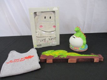 Wooden Toy Lizard Puzzle, Ceramic Dinosaur Coin Bank  And Baby Clothes