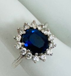 PRETTY STERLING SILVER BLUE SAPPHIRE AND WHITE STONE RING