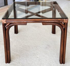 A Vintage Rattan Dining Table With Glass Top, Likely Mcguire