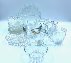 Assortment Of Glass Dishware Of Various Designs & Styles