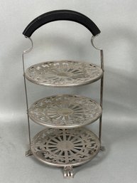 A Vintage Manning Bowman Tiered Metal Stand