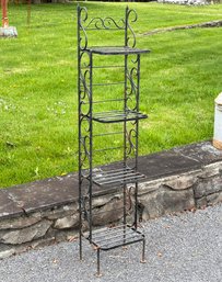 A Vintage Wrought Iron Etagere In Baker's Rack Form