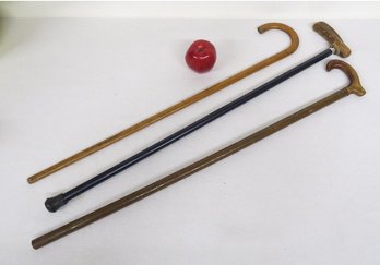 A Trio Of Vintage Wooden Walking Canes