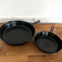 A Pair Of Cast Iron Frying Pans