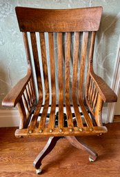 Antique Solid Wood Adjustable Rolling Chair With Cast Iron Spring Mechanism & Cushion