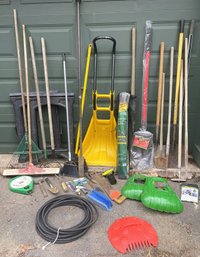 Outdoor Lot With Heavy Duty Snow Shovel, B&D 50ft. Hose Reel, Saw Horses And Other Implements Of Destruction