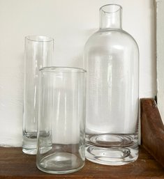 A Trio Of Large Modern Glass Bottles And Vases