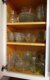 Cabinet Full Of Glass Serving Pieces, Creamers, Dishes, Small Bowls & More.