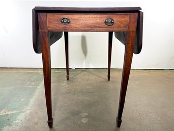 An Antique Mahogany Pembroke Table