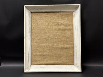 A Burlap Pinboard In A Rustic, Intentionally-Distressed Frame