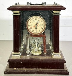 A Vintage Clock By Wallace