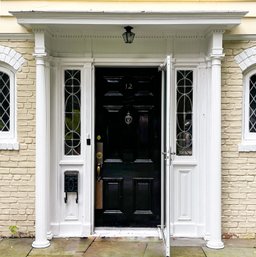 An Antique Colonial Revival Front Door, Side Lights, And Portico With Modern Storm - C. 1930's