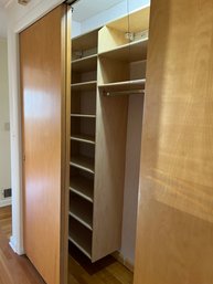 A Wood Built In Closet System - Hallway
